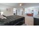 This spacious main bedroom offers luxurious carpets and flows into a sitting area with a fireplace at 20139 N Bustos Way, Maricopa, AZ 85138