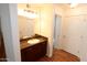 Bathroom vanity features granite countertop, modern lighting, and a framed mirror at 2025 E Campbell Ave # 120, Phoenix, AZ 85016