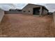 Large backyard prepped and ready for landscaping and outdoor living at 20795 N Roadrunner Ln, Maricopa, AZ 85138