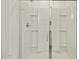 This shower features white tiling, multiple shelves, and a sliding glass door at 20795 N Roadrunner Ln, Maricopa, AZ 85138
