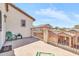 Outdoor patio with a lounging area overlooking the houses and scenery at 21050 E Munoz St, Queen Creek, AZ 85142
