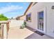 Outdoor patio with a lounging area overlooking the houses and scenery at 21050 E Munoz St, Queen Creek, AZ 85142