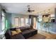 Cozy living room with plush couch and hardwood floors at 235 W Portland St, Phoenix, AZ 85003