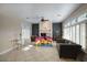 Spacious living area featuring tile floors, bright windows with a neutral color pallette at 235 W Portland St, Phoenix, AZ 85003