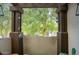 Relaxing patio with views of mature trees, outdoor lighting and fresh air at 235 W Portland St, Phoenix, AZ 85003