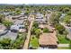 Aerial view of the house in a well-established neighborhood with mature trees at 2913 E Earll Dr, Phoenix, AZ 85016