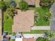 Aerial view of a home with a large yard, including a lawn, trees, and a fenced backyard at 2913 E Earll Dr, Phoenix, AZ 85016