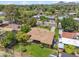 Aerial view of home with covered patio, desert landscaping, and mountain views at 2913 E Earll Dr, Phoenix, AZ 85016