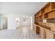 Bright living room featuring built in shelves, tiled floor and lots of natural light at 2913 E Earll Dr, Phoenix, AZ 85016