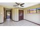 Office space features closet, tile floors, fan, and natural light at 2913 E Earll Dr, Phoenix, AZ 85016