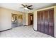 Sun room with sliding door to covered patio and full size storage closet at 2913 E Earll Dr, Phoenix, AZ 85016