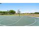 Well-maintained basketball court with a playground, perfect for Gathering activities in the community at 30517 N Maple Chase Dr, San Tan Valley, AZ 85143