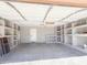 Spacious and organized garage with built-in shelves for ample storage at 30517 N Maple Chase Dr, San Tan Valley, AZ 85143