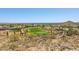 Scenic golf course view with desert landscape and custom homes in upscale gated community at 30517 N Maple Chase Dr, San Tan Valley, AZ 85143