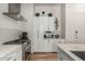 Modern kitchen featuring stainless steel appliances, sleek cabinetry, and stylish backsplash, creating a functional and elegant space at 3131 N Central Ave # 7004, Phoenix, AZ 85012