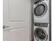 Convenient laundry area with stacked washer and dryer, maximizing space and providing efficient laundry solutions at 3131 N Central Ave # 7004, Phoenix, AZ 85012