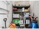 Resident storage unit with metal shelving and personal items at 3131 N Central Ave # 7004, Phoenix, AZ 85012