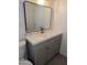 Bathroom vanity showcasing stylish design and a sleek mirror at 3421 W Montecito Ave, Phoenix, AZ 85017