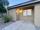Cozy front patio area of a home, complemented by xeriscape landscaping at 3511 E Baseline Rd # 1098, Phoenix, AZ 85042