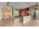 Inviting foyer featuring travertine floors, double doors, and seamless flow into the adjacent living spaces at 3531 E Norwood Cir, Mesa, AZ 85213