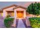 Inviting home entrance with double doors, manicured landscaping and a warm, welcoming ambiance at 3531 E Norwood Cir, Mesa, AZ 85213