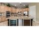 Gourmet kitchen featuring custom cabinets, granite countertops, and stainless steel appliances for modern living at 3531 E Norwood Cir, Mesa, AZ 85213