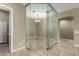 Corner office with travertine floor and glass-enclosed walls and doorway at 3531 E Norwood Cir, Mesa, AZ 85213