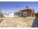 Spacious backyard featuring a private pool, covered patio, and well-kept landscape, perfect for outdoor living at 3823 W Rose Ln, Phoenix, AZ 85019
