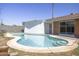 Inviting backyard pool offering a relaxing oasis with a well-maintained patio and lush surroundings at 3823 W Rose Ln, Phoenix, AZ 85019