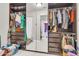 Spacious walk-in closet with custom shelving and ample storage space for clothes and accessories at 40638 N High Meadows Dr, San Tan Valley, AZ 85140