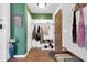 Bright entryway featuring stylish hooks, a coat rack, and a convenient shoe storage bench at 40638 N High Meadows Dr, San Tan Valley, AZ 85140