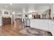 Open concept kitchen with stainless steel appliances and hardwood floors at 40638 N High Meadows Dr, San Tan Valley, AZ 85140