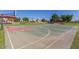 Community basketball court with multiple hoops surrounded by green spaces at 4332 E Stanford Ave, Gilbert, AZ 85234