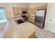 Bright kitchen featuring stainless steel appliances and light wood cabinetry at 4332 E Stanford Ave, Gilbert, AZ 85234