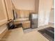 Kitchen with stainless steel appliances and wood cabinets at 4332 E Stanford Ave, Gilbert, AZ 85234