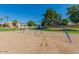 Community swing set with mature trees at 4332 E Stanford Ave, Gilbert, AZ 85234
