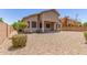 Large backyard with desert landscaping and privacy fence at 43502 W Kramer Ln, Maricopa, AZ 85138