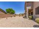 Large backyard area featuring low maintenance landscaping at 43502 W Kramer Ln, Maricopa, AZ 85138