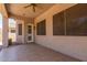 Covered backyard patio with tiled flooring at 43502 W Kramer Ln, Maricopa, AZ 85138