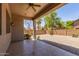 Backyard patio with desert landscaping and block fence at 43502 W Kramer Ln, Maricopa, AZ 85138