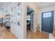 Bright entryway with hardwood floors, leading to an office and dining area at 4842 E Fairmount Ave, Phoenix, AZ 85018