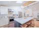 Spacious kitchen with a large center island, stainless steel appliances, and open layout concept at 4842 E Fairmount Ave, Phoenix, AZ 85018