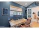 Stylish home office featuring a wooden desk, modern monitors, and a serene atmosphere at 4842 E Fairmount Ave, Phoenix, AZ 85018