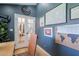Home office with natural light and wall art at 4842 E Fairmount Ave, Phoenix, AZ 85018