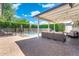 Outdoor patio with poolside seating and a covered pergola, offering a relaxing space for outdoor entertaining at 4842 E Fairmount Ave, Phoenix, AZ 85018