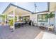 Expansive outdoor patio featuring comfortable seating, dining area, and manicured landscaping at 4842 E Fairmount Ave, Phoenix, AZ 85018