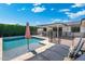 Enjoy the pool and backyard with sun loungers and a covered patio area at 4842 E Fairmount Ave, Phoenix, AZ 85018