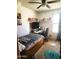 Cozy bedroom with a single bed, desk, and window with natural light at 5136 E Evergreen St # 1053, Mesa, AZ 85205