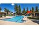 Community pool showcasing clear blue water, ample seating, and shaded lounge areas at 5136 E Evergreen St # 1053, Mesa, AZ 85205