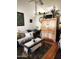 Comfortable living room with a wooden cabinet and plenty of decor and storage at 5136 E Evergreen St # 1053, Mesa, AZ 85205